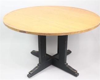 Lot 254: Round Wooden School House Pedestal Dining Table (1/4). A round work table from a school. Possibly maple top with green/gray painted legs. The table top has fun and interesting little scribbles from years of students use. Comfortably seats four and would be a great kitchen table. This is one out of four similar tables in this auction.

Dimensions are 29 in h x 48 in w x 48 in d. Condition is good. Scratches and initials carved into table top. Discoloration and wear to paint. Please call or email for a detailed condition report.