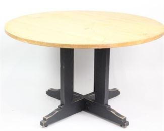 Lot 256: Round Wooden School House Pedestal Dining Table (3/4). A round work table from a school. Possibly maple top with green/gray painted legs. The table top has fun and interesting little scribbles from years of students use. Comfortably seats four and would be a great kitchen table. This is the third out of four similar tables in this auction.

Dimensions are 29 in h x 48 in w x 48 in d. Condition is good. Scratches, color markers and initials carved into table top. Discoloration and wear to paint. Please call or email for a detailed condition report.