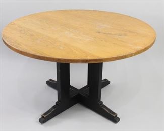 Lot 257: Round Wooden School House Pedestal Dining Table (4/4). A round work table from a school. Possibly maple top with green/gray painted legs. The table top has fun and interesting little scribbles from years of students use. Comfortably seats four and would be a great kitchen table. This is the fourth out of four similar tables in this auction.

Dimensions are 29 in h x 48 in w x 48 in d. Condition is good. Scratches and initials carved into table top. Discoloration and wear to paint. Please call or email for a detailed condition report.