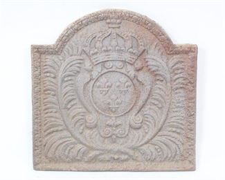 Lot 278: French Style Cast Iron Fireback w/Fleur de Lis. Handsome fireback is decorated with a coat of arms with fleur de lis in the center, with a crown at the top and feathers on either side. All of the firebacks in this auction were found locally in a barn; they show good age but we are unsure of their actual manufacture date.
Dimensions are 18.5 in h x 18.5 in w x .75 in d. Condition is fair with surface oxidation throughout. Please call or email for a detailed condition report.