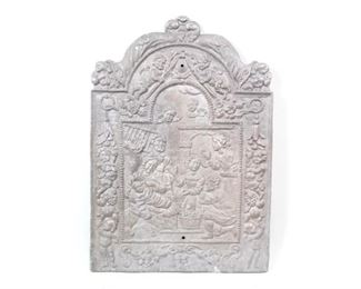 Lot 279: Cast Aluminum Fireback w/Cherubs & Horns of Plenty. Handsome fireback is decorated with a domestic scene in the center, with a surround representing love and prosperity with Cherubs, fruit and horns of plenty. All of the firebacks in this auction were found locally in a barn; they show good age but we are unsure of their actual manufacture date.
Dimensions are 39 in h x 27.25 in w x .75 in d. Condition is good with surface oxidation throughout. Please call or email for a detailed condition report.