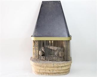Lot 287: Electric Fiberglass Faux Fireplace w/Metal Top & Screen. A faux fireplace made in fiberglass and top in hammered metal. Has a coiled metal screen with brass pulls. Light hidden behind the logs. Can be placed against any wall and plugged in for an instantly cozy atmosphere.

Dimensions are 59.25 in h x 35.2 in w x 19.25 in d. Condition is good. Some scuffs and discoloration throughout. Please call or email for a detailed condition report.