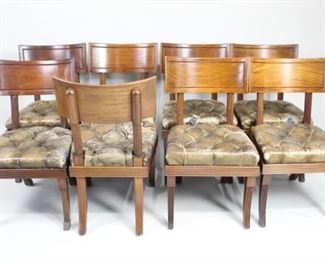 Lot 302: Lot of 8 Matching Klismos Style Leather Tufted Chairs. Handsome set of chairs have wooden frames with curved backs, curved saber legs and tufted leather seats. Chairs need repair, but well worth the effort to have such a stylish set of dining chairs.
Dimensions are 33.5 in h x 20 in w x 20 in d. Seat height is 18 in h. Condition is fair with leather cracking and torn, minimal wear to the wood, and one back is wobbly. Please call or email for a detailed condition report.