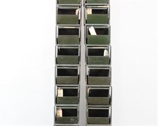 Lot 340: 20 Industrial Stackbin Stacking Hardware Store Bins 1/2. Painted army green, stacking and interlocking bins have open fronts and handles on the back. Marked Stackbin, Pawtucket RI. Plentiful storage for retail, shop or studio.
Dimensions of each bin are 8.5 in h x 10.5 in w x 19 in d. Condition is good with wear to the metal and dust. Please call or email for a detailed condition report.