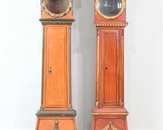 Lot 368: Pair of Antique Danish Bornholm Grandfather Longcase Clock Cases. Beautiful wooden cases have openwork gables, painted trim, garlands around the round openings where the clock faces go, and carved drapery on the bases. Gorgeous cases are worthy of restoration.
Dimensions are 79 in h x 23 in w x 8.75 in d. Condition is good though one is missing the glass and there are some cracks in the wood. Please call or email for a detailed condition report.