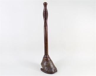 Lot 380: Turned Wood & Horse Hoof Door Stop,Taxidermy. An antique door stop made of a horse hoof and a turned wooden handle. The handle extends through the hoof, which is dressed in an shoe, providing some style and weight.

Dimensions are 20.5 in h x 3.75 in w x 5.5 in d. Condition is good. Scuffs and surface wear throughout. Please call or email for a detailed condition report.