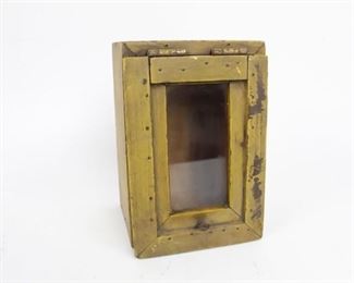 Lot 443: Antique Mustard Yellow Paint Wood & Glass Box,Folk Art. This small rustic yellow painted wooden box with glass door. This charming little box can be used as storage and you won't even need to open it up to see what's inside. 

The dimensions are 9in x 6in x 5in. It is in good condition with surface rust, wear, and painted coming off in places. Please call or email for a detailed condition report.