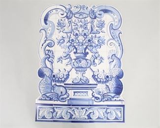 Lot 454: 35 Hand Painted Portuguese Viuva Lamego Azulejos Tiles. A lot of 35 hand painted tin glazed ceramic tiles in blue and white. The tiles were purchased new in the 1980s in Lisbon, Portugal and were never used. When assembled they form a wonderful floral and fish motif mural. Signed "V.L. MFS" on front. Marked "Viuva Lamego Lisboa Made in Portugal" on the back. Each tile is numbered on the back for assembly. Comes packaged in box. From the collection of Barbara Porter & Robert Wincuinas.

Dimensions are 38.5 in h x 27.5 in w. Condition is excellent. Please call or email for a detailed condition report.