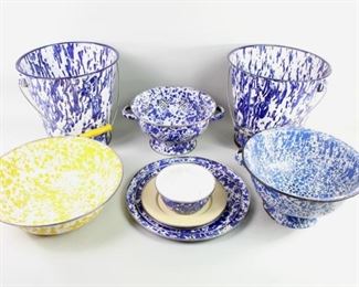 Lot 455: 11 Pc Blue Yellow Cream Kitchen Graniteware Enamelware. Large lot includes 5 plates, 1 small bowl, 1 large bowl, 2 colanders and 2 buckets. Most are decorated in a blue and white splatter/marbled pattern; the large bowl is yellow & white marbling and one plate is cream enamel. One of the strainers is marked Made in Indonesia.
Dimensions range from 2.5  in h x 5.75 in w x 5.75 in d to 11 in h x 11.75 in w x 11.75 in d. Condition is good with surface wear throughout, wear to edges and minor rust spots. Please call or email for a detailed condition report.