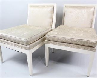 Lot 461: Pair Jacques Quinet Style White Lacquer Slipper Chairs. Beautiful and chic matching pair of slipper chairs in the style of Jacques Quinet have white lacquered frames, with backs and tufted seats upholstered in champagne colored satin. Elegant seating for your bedroom or living area.
Dimensions are 33.5 in h x 24 in w x 29.5 in d. Condition is good though both seat cushions have stapled repairs on one side, minor discoloration to the cushions and crazing to the lacquer. Please call or email for a detailed condition report.