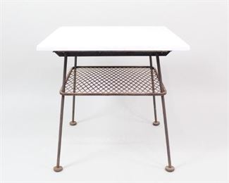 Lot 466: Mid-Century Modern Russell Woodard Sculptura Table. A metal garden or patio table by Russell Woodard with a white granite stone top. Thick plywood board between table and granite top. Excellent little outdoor side table.

Dimensions are 23.5 in h x 23.75 in w x 23.75 in d. Condition is good. Metal has wear and surface rust. Minor wear to granite. Chip on one corner. Please call or email for a detailed condition report.