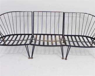 Lot 467: Mid Century Modern Russell Woodard Pinecrest Patio Sofa. Made of black painted iron, 3 section modular sofa is in the Pinecrest pattern by Russell Woodard (labeled). Can be configured as a sofa, or a loveseat and chair. No cushions are included. Versatile set will be wonderful in your garden, patio or porch.
Dimensions of the sofa altogether are 27.5 in h x 83 in w x 28 in d. Seat height is 12 in h. Condition is good. Please call or email for a detailed condition report.