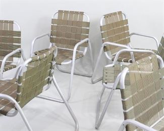 Lot 468: Set/6 Mid Century Modern Stacking Aluminum Lawn Chairs. With aluminum tubular frames and green & tan striped webbing, classic chairs stack to save space. Perfect for holding your outdoor gatherings in mid century style.
Dimensions are 29 in h x 21.75 in w x 29.25 in d. Condition is good to fair with some fading and discoloration to webbing, some torn webbing, and oxidation on the aluminum. Please call or email for a detailed condition report.