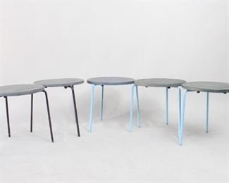 Lot 476: 5 Modern Stackable Fibreform Garden Patio Tables,Stools. A set of five, small side tables that can be used inside or out. Painted aluminum legs, three in light blue and two in black, with molded fiberglass tops in stone or concrete imitation. "Fibreform" label underneath top.

Dimensions are 15.75 in h x 17 in w x 17 in d. Condition is good. Some cracks and scratches to fiberglass. Please call or email for a detailed condition report.