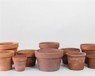 Lot 478: 10 Round Terracotta Clay Garden Flower Planter Pots. A set of ten terracotta pots in various sizes, the smallest five inches tall and the largest 11 inches. All have drainage holes in the bottom. Perfect set to start the growing season.

Dimensions for the smallest are 5.5 in h x 7.25 in w x 7.25 in d. Dimensions for the largest are 11 in h x 12.5 in w x 12.5 in d. Condition is good. Surface wear and chips. Please call or email for a detailed condition report.