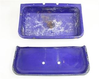 Lot 480: Blue Enamel Kitchen Bathroom Sink w/Backsplash. Metal enamel sink with backsplash in a deep cobalt or royal blue. Cut out holes for pipes and faucets. 

Dimensions for sink are 8 in h x 36.5 in w x 21.75 in d. Dimensions for backsplash are 16.5 in h x 37.5 in w x 2.5 in d. Condition is good. Enamel chipped, scratched in some places. Paint on interior of sink. Integrity is sound. Please call or email for a detailed condition report.