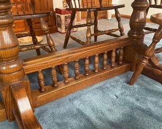 Nathan Hale solid oak dining table with six chairs. Comes with table pads and two leaves. 65 inches long by 42 inches wide. Each leaf 11 inches. Total length with leaves 64 inches long