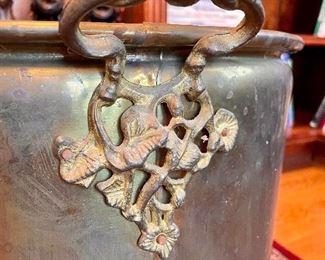 Ornate Detail of the Brass Kettle Handles