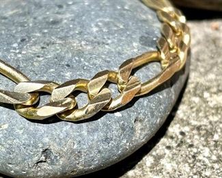 $1600; men’s solid 14KT gold link bracelet