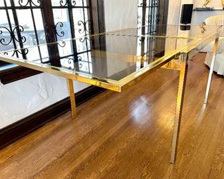 View showcasing the Solid Brass Table with sides extended open to 52”; 