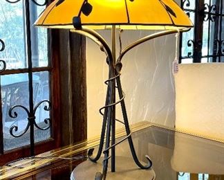 $120; Quoizel Collectibles slag glass and iron table lamp with leaves and a leaf pull; 17”d x 24”h