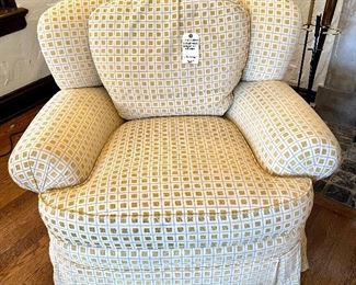 $800; pair of Jessica Charles swivel rockers with one ottoman with golden squares and ivory upholstery; chair: 41”w x 42”d x 32”h   ottoman: 32”w x 23”d x 17”h