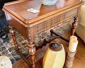 $450; gorgeous, vintage side table with turned legs and beautiful grain and carved details; 30”w x 18”d x 28.5”h
