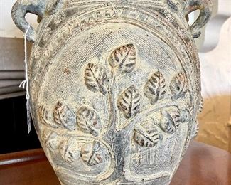 $100; painted, ceramic vase with elephant trunk handles and tree details; 10”d x 16”h