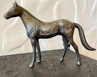 $100; etched, brass horse with exquisite detail; 10”w x 2”d x 7”h