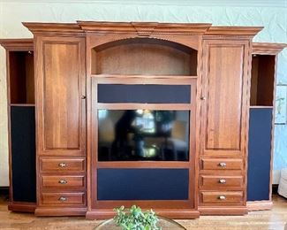 $3000; custom-made, wood entertainment center with built-in speaker screens for surround-sound (Speakers Sold Separately), two doors and six drawers (two with built-in dividers), cut out for 48” tv, dimmer lights in three cabinets, beautiful moulding;  ***Professional Disassembly Required***                   
Measures: 135”w x 28” x 88”h