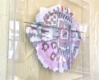 $200; “Paper Quilt” plate #1 by Dion2; textile, mixed-use medium; original price $250;                                              Measures: 20.25”w x 19.25”h