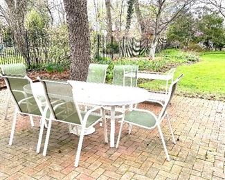 $240 Set of 6 White, metal sling-back green mesh chairs, weather proof and easy to clean Measures: 22x27x41