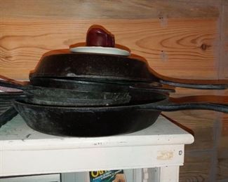 Several pieces of Cast Iron Cookware