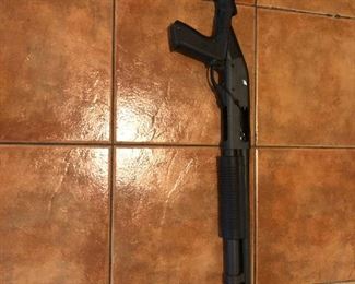 Remington 870 12-guage tactical shotgun left side