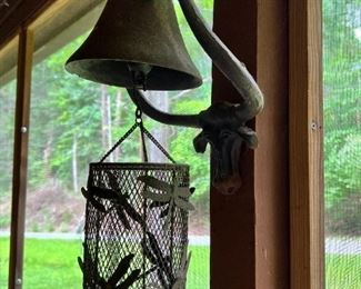 Metal bell and dragonfly candle holder