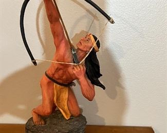 kneeling archer figure