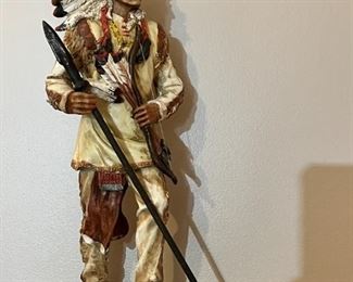Standing native American figure
