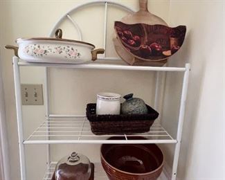 Metal shelf with assorted kitchen items