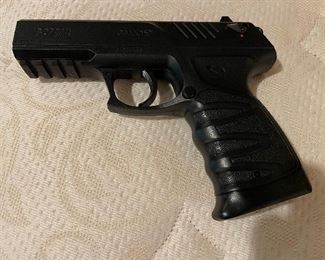 P-27 Dual BB gun (left side). Powered by CO2 and featuring a double/single action trigger, the P-27 launches BBs or pellets