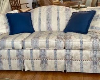 Upholstered Camel Back Sofa