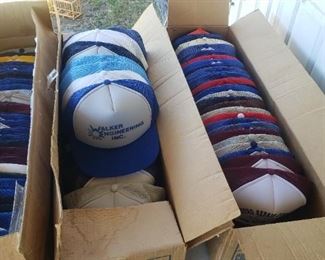 tons of ball caps, all different