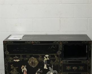 One of several Oriental lacquered chests with mother of pearl inlays