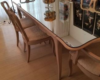 Dining table with glass top