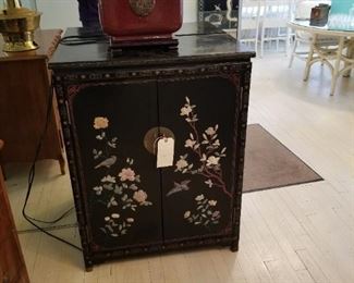 Small Oriental lacquer ware chest with inlay