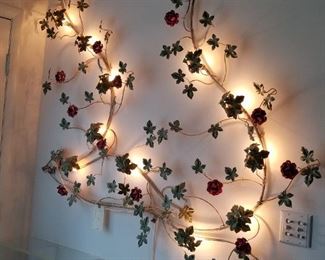 Very unusual floral, metal wall light