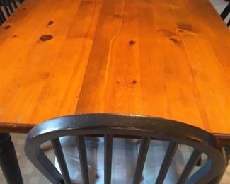 Amish pine table with midnight blue chairs.  Matches cupboard.