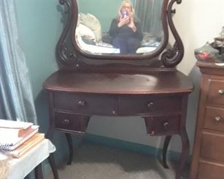 Victorian vanity; mahogany veneer over cherry wood. Circa 1880
