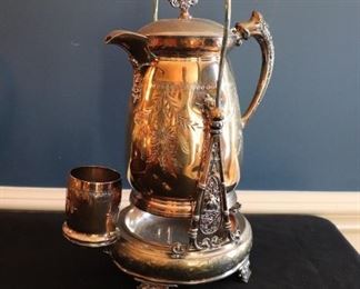 Antique Tilting Water Pitcher 