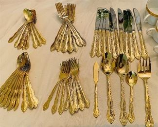 14______$75 
Gold washed set of flatware by International Service for 11