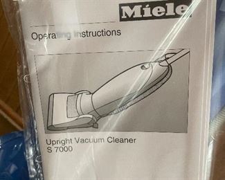 28______$290 		
Miele vacuum cleaner Upright S7000